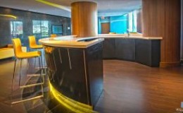 Lobby Bar with Curved Granite Countertop